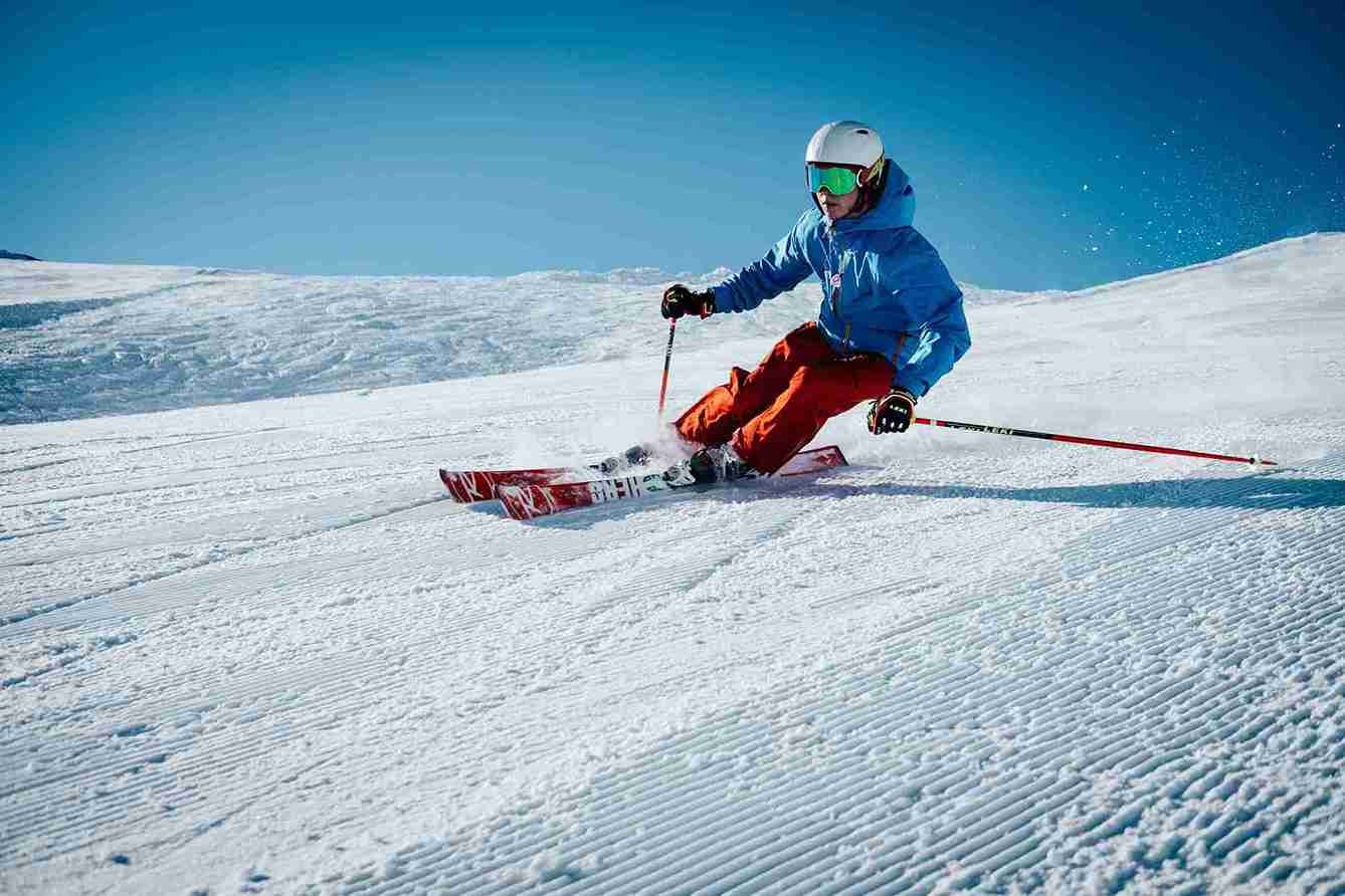 Auli skiing and gondola ride during winter snowfall.